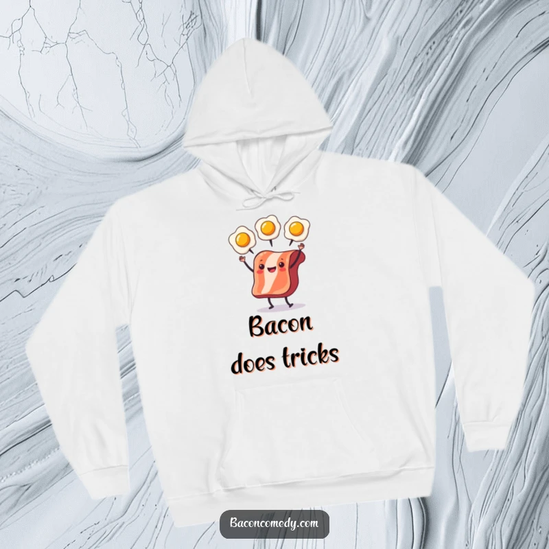 Funny Bacon Juggling Hoodie featuring a slice of bacon juggling eggs, ideal for cozy wear and humorous expression.